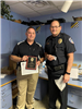 Detective Jim Adams receives the Officer of the Quarter award