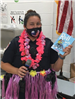 Officer Jen at Ocean Breeze Elementary presenting a Book Club Award
