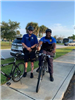 Chief Butler and Sergeant Carter Posing before bike patrol