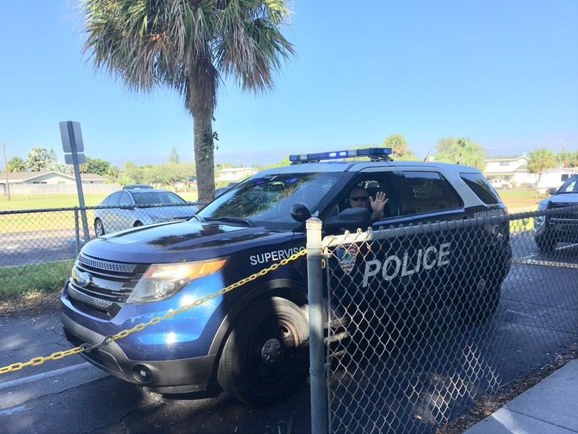 Sergeant John Barberi participates in a vehicle parade